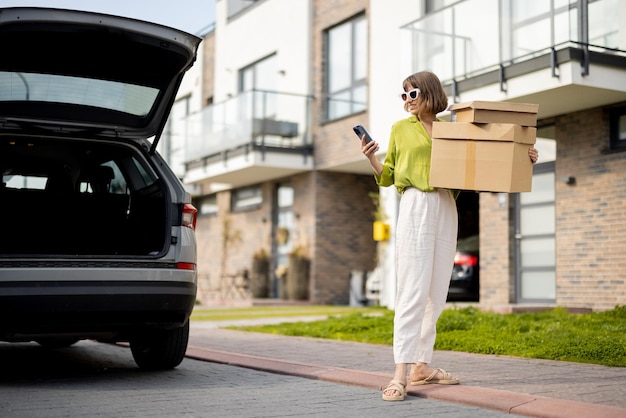 Woman with parcels walks home