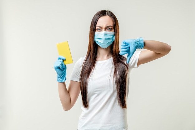 Woman with passport wearing mask and gloves