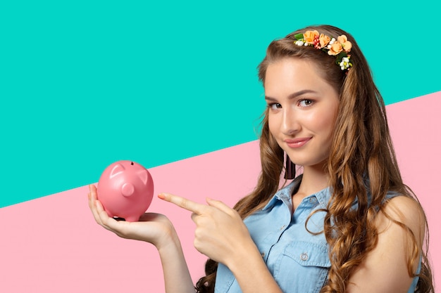 Woman with a piggy bank