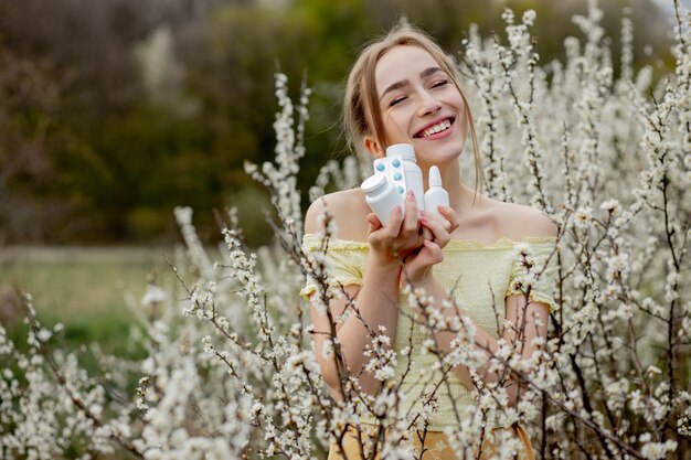 Woman with pills in her hands