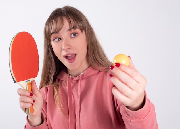 Woman with a ping pong racket