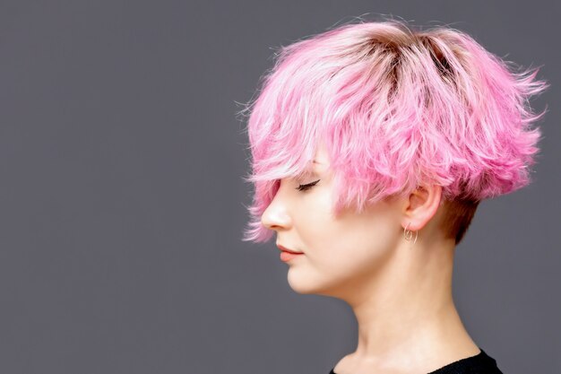 Woman with pink hairstyle