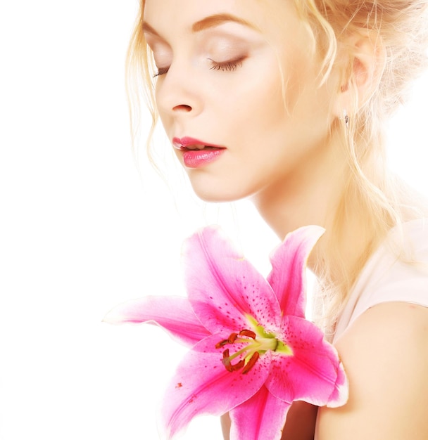 Woman with pink lily highkey portrait