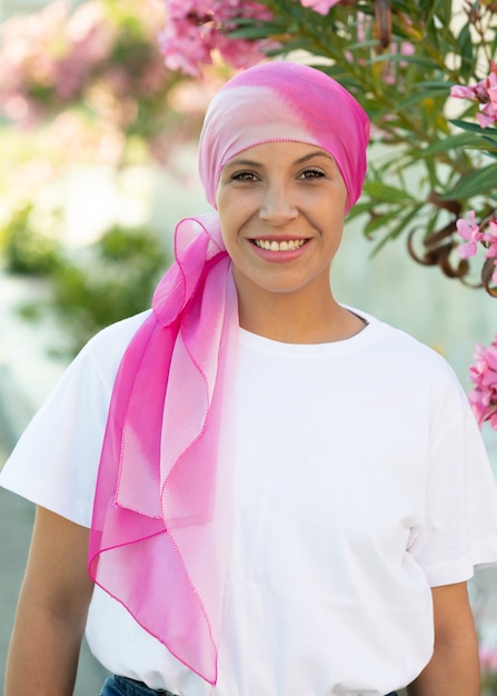 Woman with pink scarf on the head