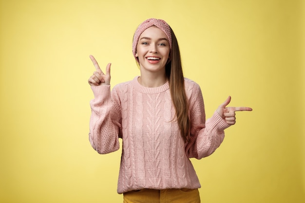 Woman with pink sweater over yellow