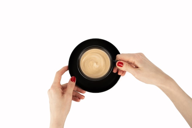 Woman with red manicure holding a black coffee cup isolated on a white background with clipping path