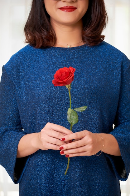 Woman with red rose