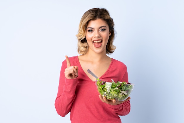 Woman with a salad bowl