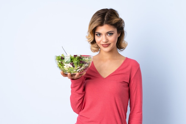 Woman with a salad bowl