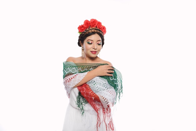 Woman with scarf and makeup with the colors of the Mexican flag