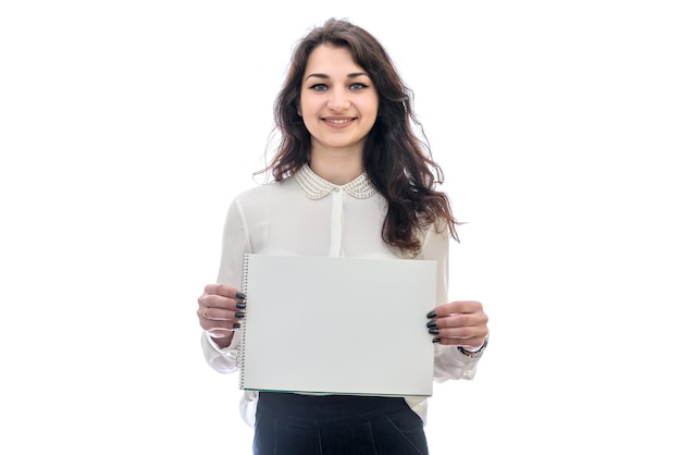 Woman with sheet of paper isolated on white wall