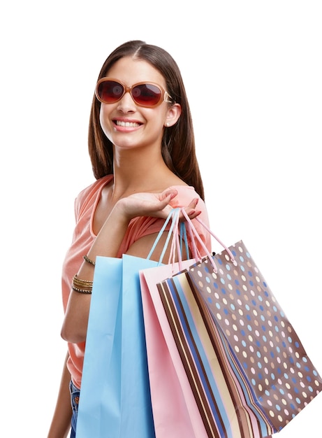 Woman with shopping bag retail and fashion with shopping and sunglasses isolated on white background Discount sale and customer with paper bag luxury designer brand and clothes with happy woman
