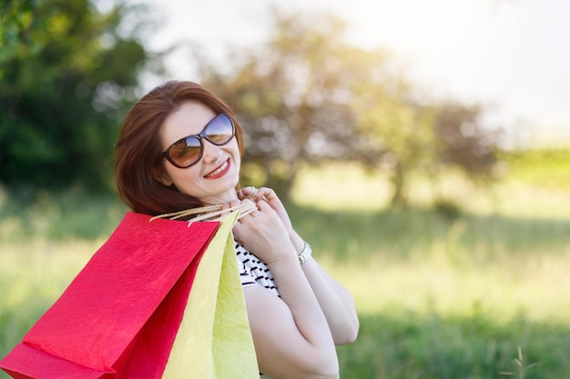 A woman with a shopping bag