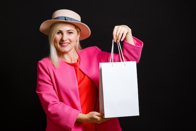 woman with shopping bags on black friday