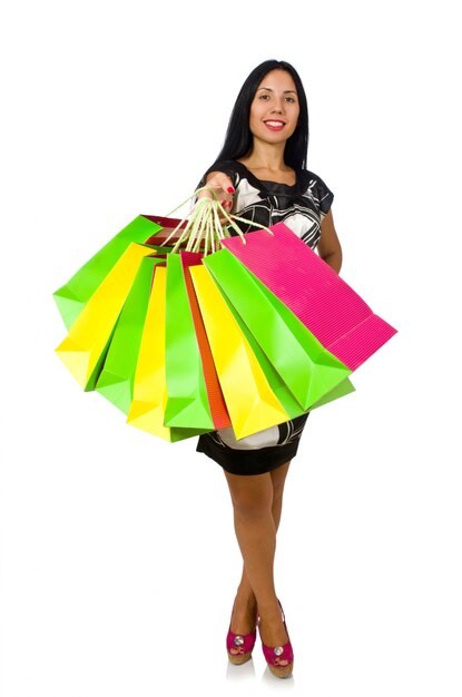 Woman with shopping bags isolated on white