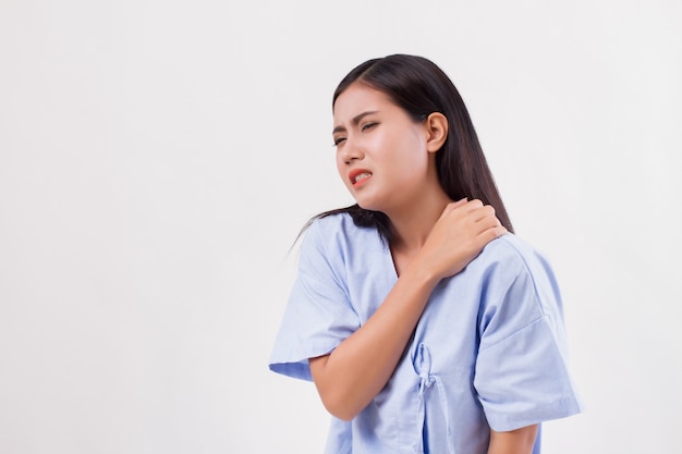 Woman with shoulder or neck pain, stiffness, injury