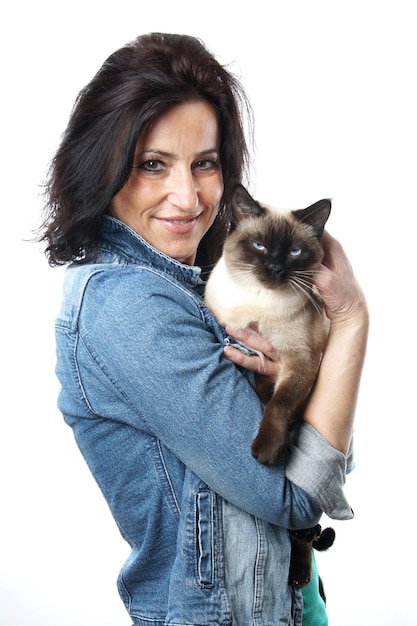 Woman with siamese cat