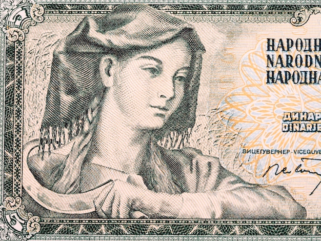 Woman with sickle from Yugoslav money Dinar