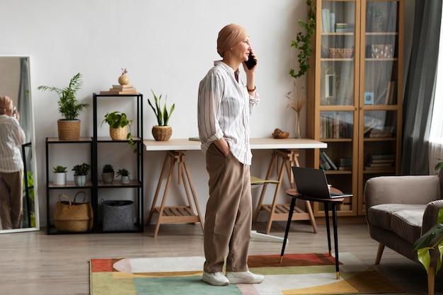 Photo woman with skin cancer spending time at home