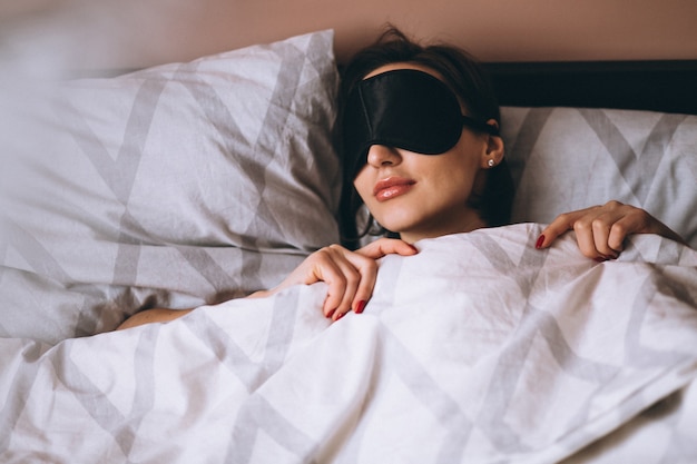 Woman with sleeping mask