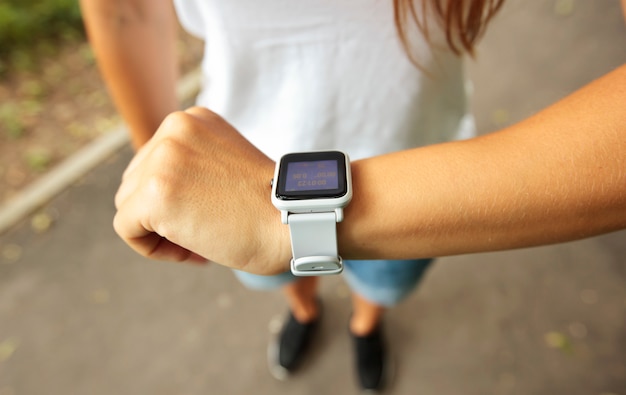 Woman with a smartwatch on her wrist