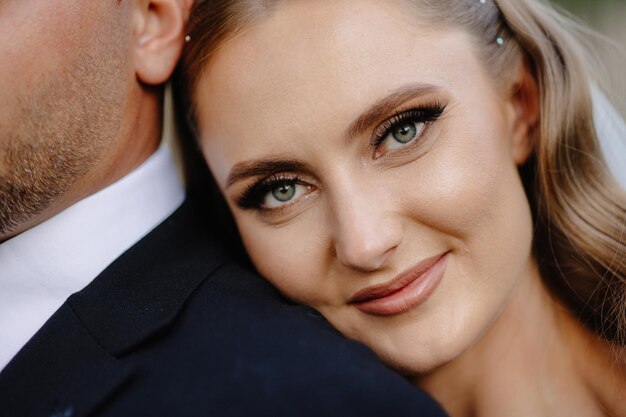 a woman with a smile on her face is posing for a photo