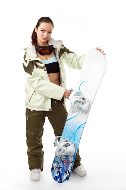 Woman with a snowboard isolated on white