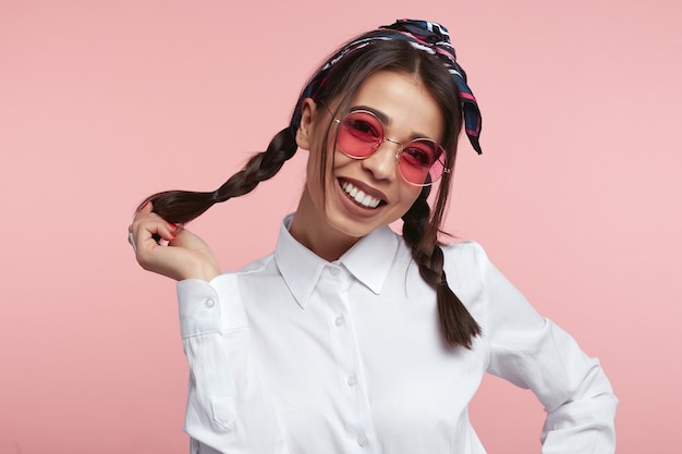 Woman with sunglasses smiling