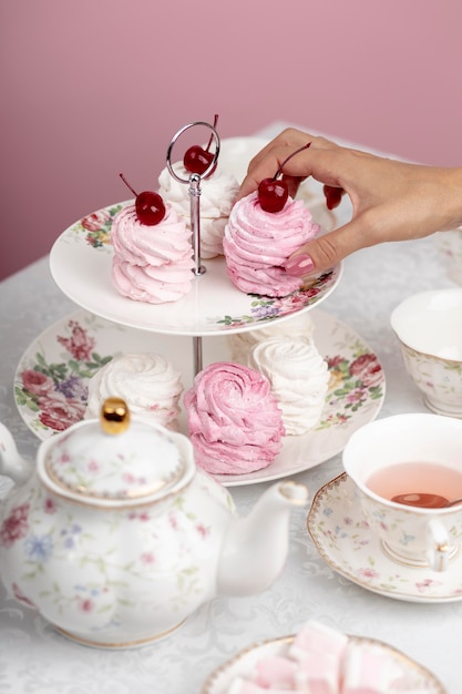 Photo woman with tea party composition