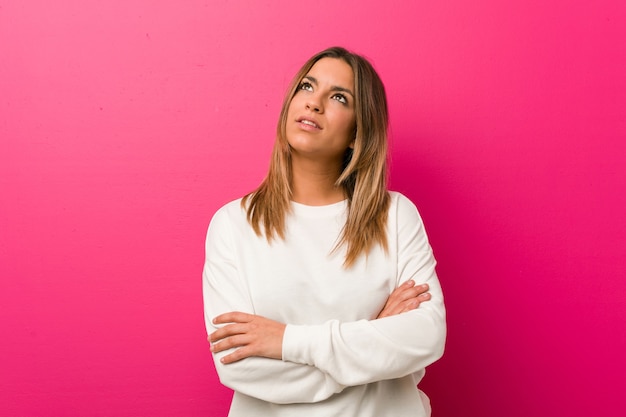 Woman with a thinking expression