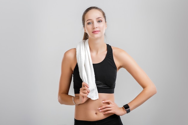 Woman with a towel after a workout