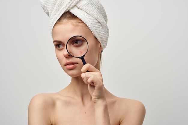 Woman with a towel on my head dermatology isolated background