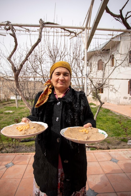 woman with traditional halisa in uzbekistan