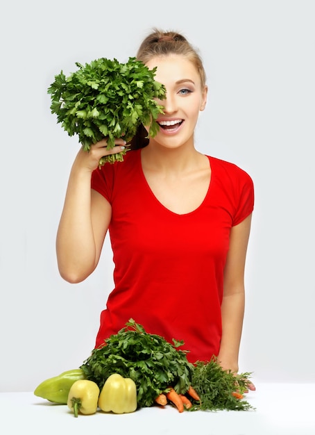 Woman with vegetable groceries