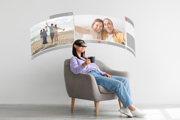 woman with virtual reality headset video calling at home