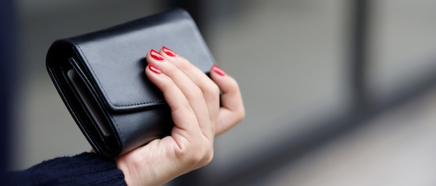 A woman with a wallet Ready for online shopping