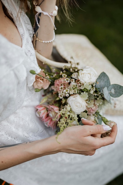 Woman with a woven bag full of flowers