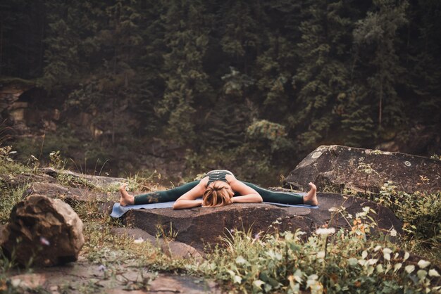 The woman in the wood, meditation outdoors yoga