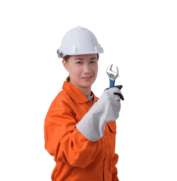 Woman worker in Mechanic Jumpsuit is holding a wrench isolated on white background