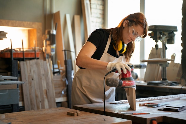 Woman working in atelier side view