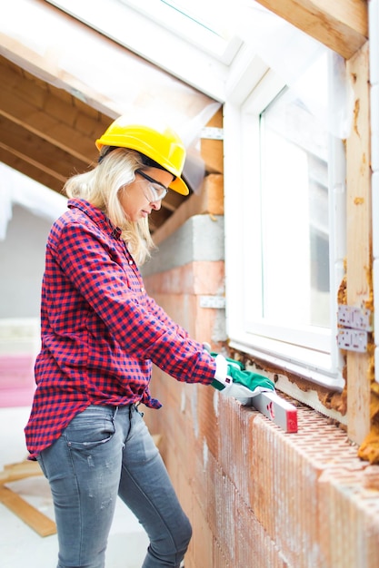 Woman working at construction site