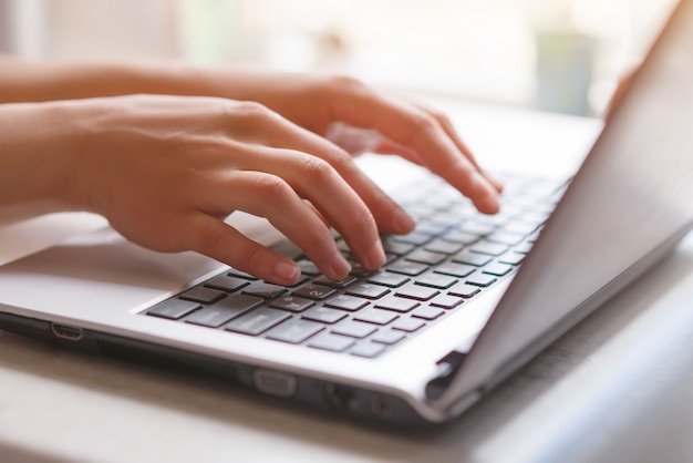 Woman working from home on computer