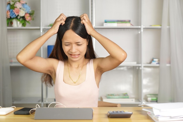 woman working at home Itchy skin on the scalp