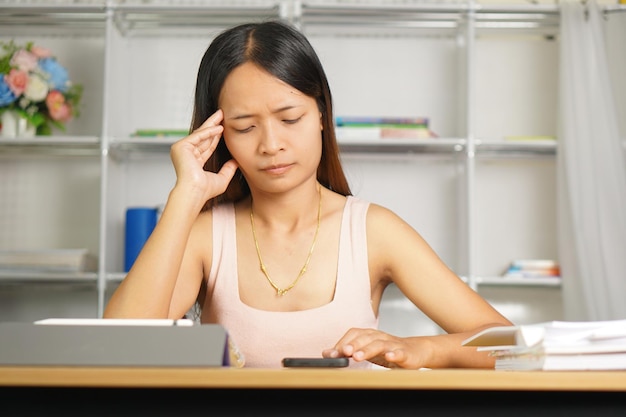 woman working at home Missed the work that was not completed as required by the customer