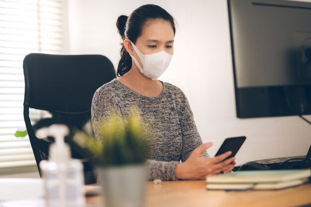 Woman working at home. Office worker on quarantine. Home working to avoid virus disease. Freelancer or remote worker concept.
