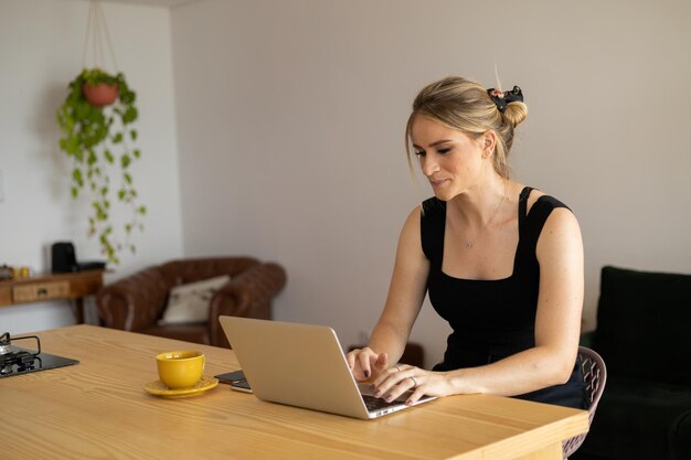 Photo woman working at home with laptop home office  notebook for working