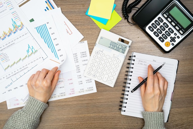 Woman working on laptop at home office Business and finance concept