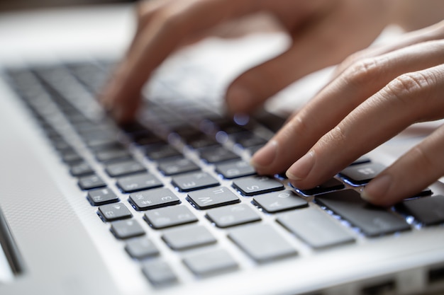 Woman working on laptop at home