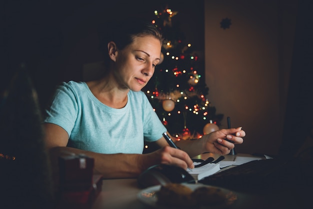 Woman working late