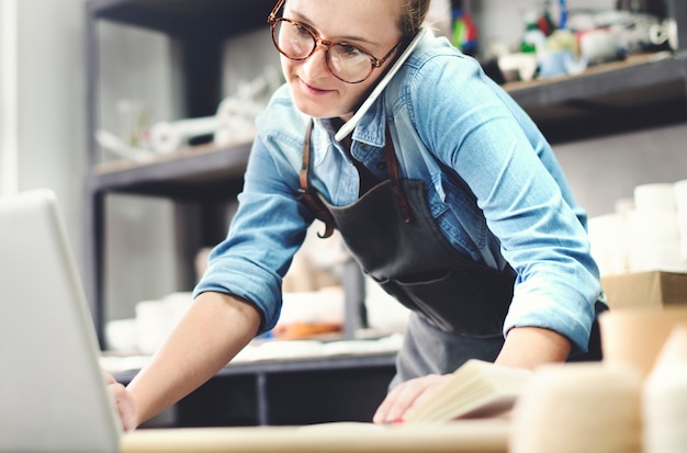 Woman working in a pottery studio